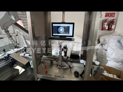 エンジンオイルのキャップをソートする機械